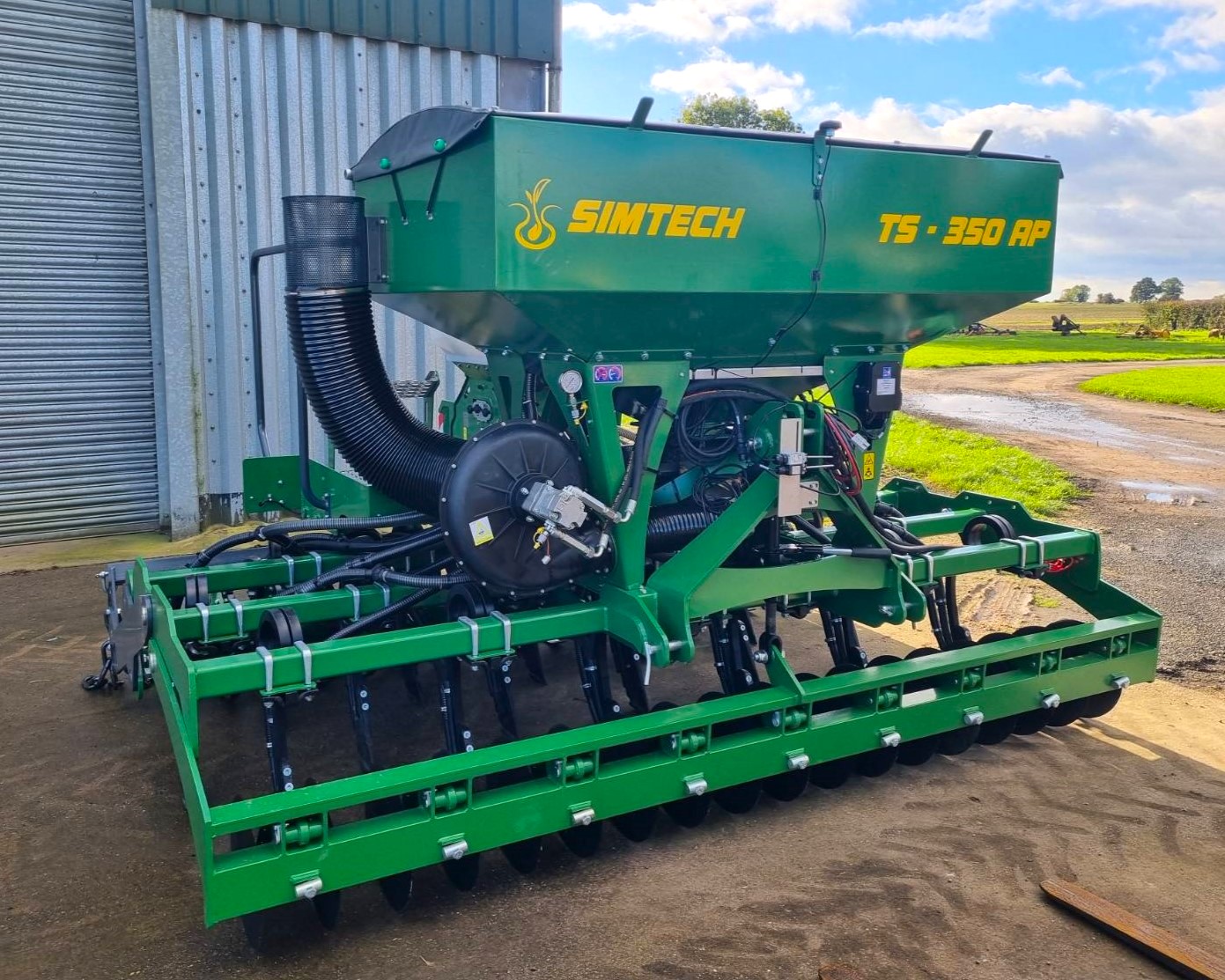 Simtech fully mounted rigid seed drill.